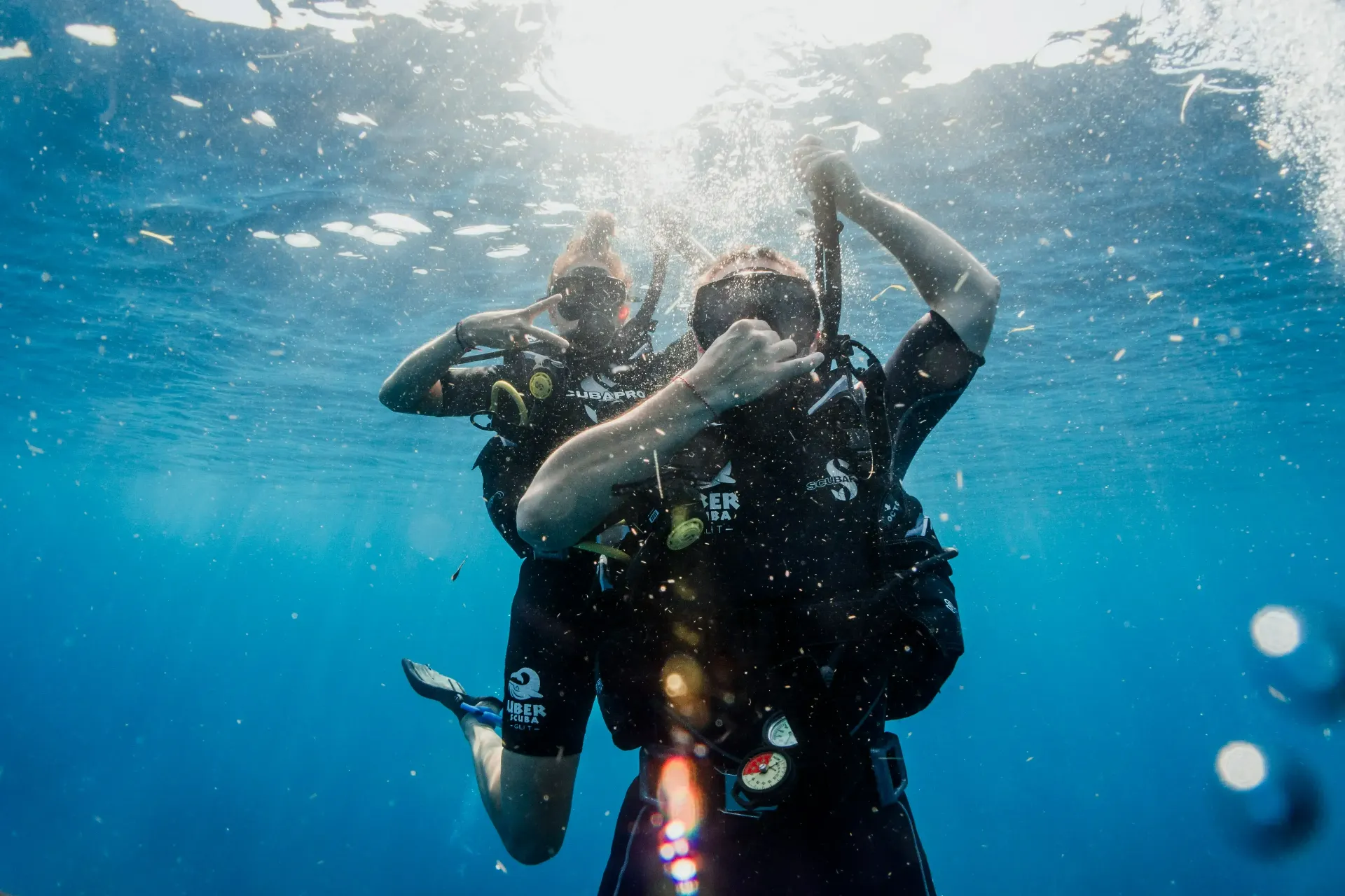 Guests snorkeling in clear water